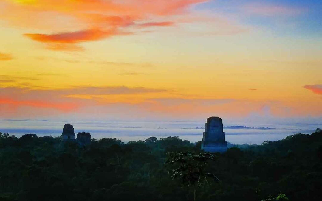 The sunrise at Tikal with the view of some of the Top 10 Must-See Structures in Tikal