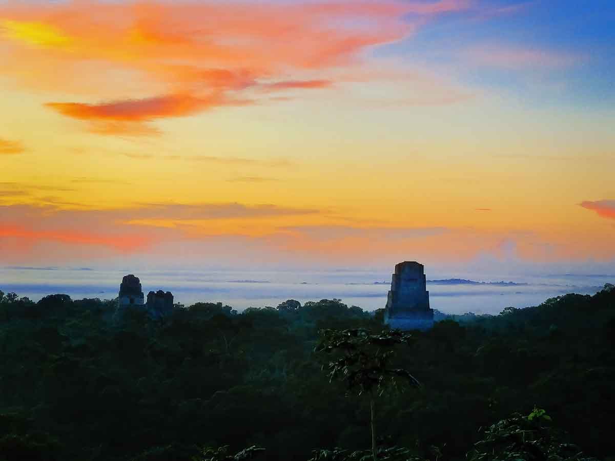 The sunrise at Tikal with the view of some of the Top 10 Must-See Structures in Tikal