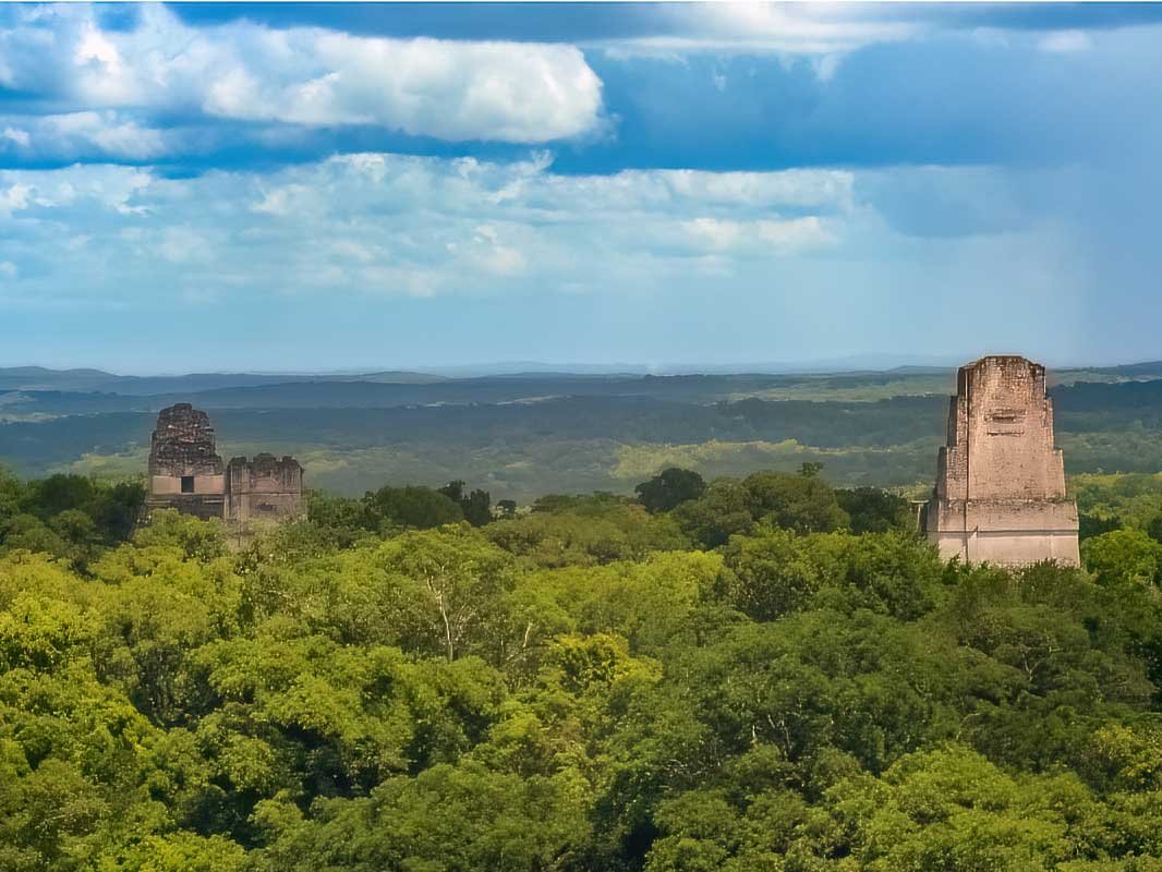 Tikal main temples observed during the Tikal Day Tour From Flores