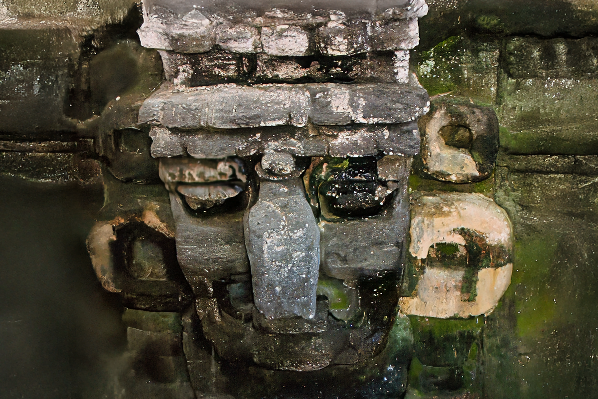 A mask of the Tikal's North Acropolis depicting the Rain God.