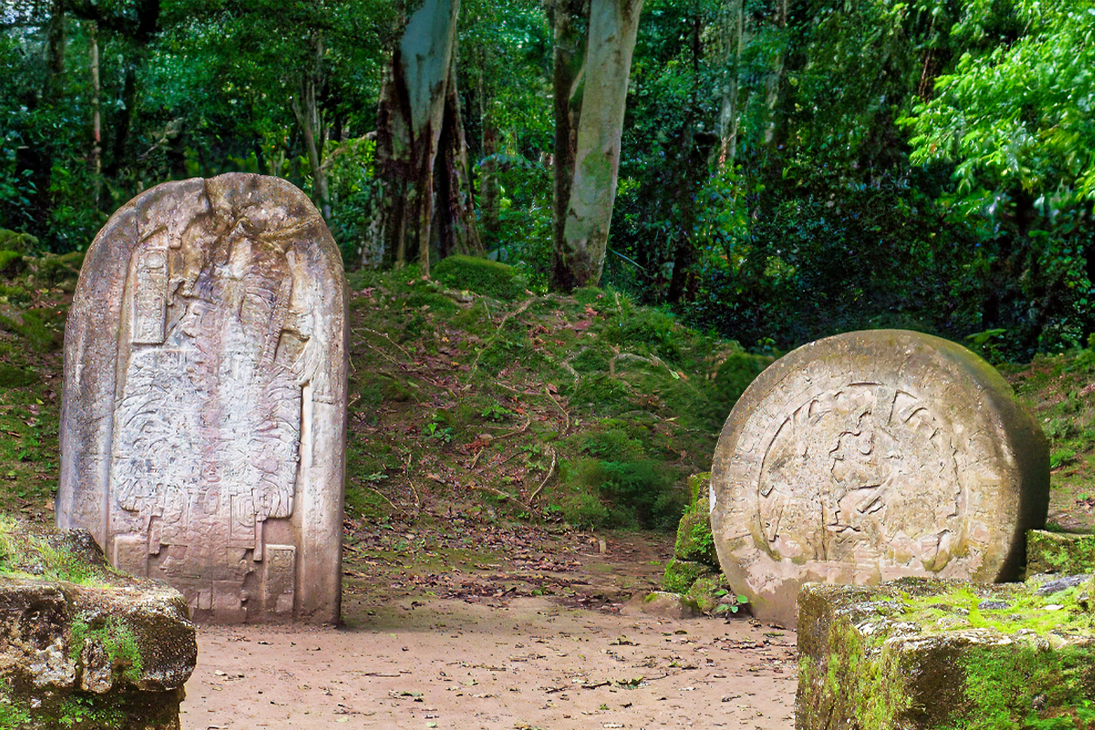 Stela 16 depicting a Jasaw Chan K'awil, one of the rulers of Tikal, and altar 5.